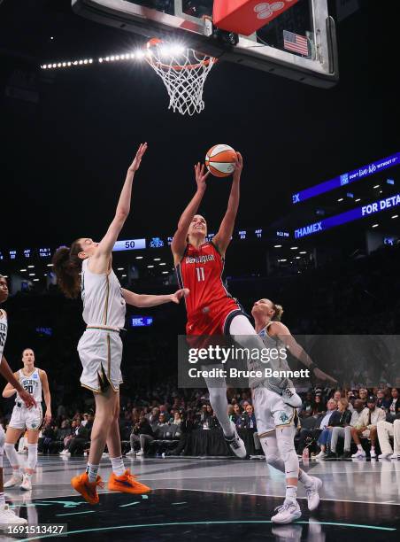 Elena Delle Donne of the Washington Mystics scores two against the New York Liberty during Game Two of Round One of the 2023 Playoffs at the Barclays...