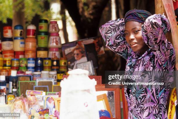 Young girl displays her goods at the market in Segou, Mali.