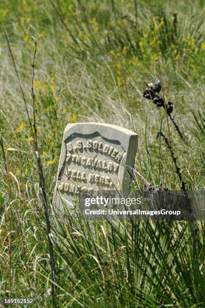 Gravestone marks the spot where a soldier of the 7th U.S. Cavalry fell during Custers Last Stand at the Battle of Little Bighorn on June 25, 1876 .