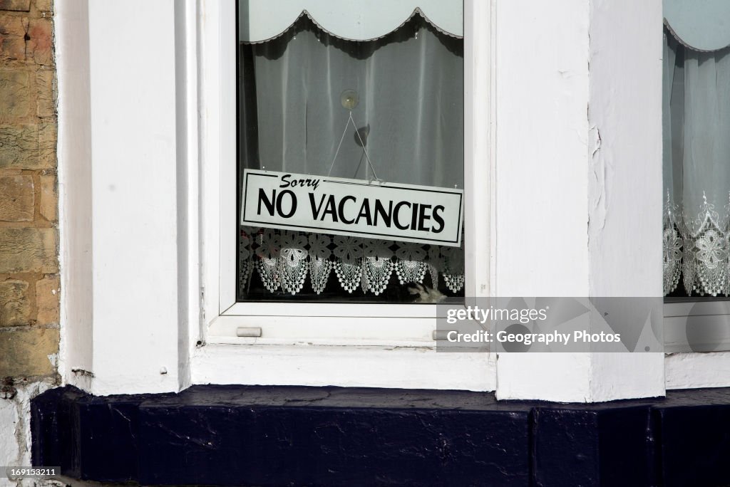No vacancies sign in window. Seafront guest houses out of season, Lowestoft, Suffolk, England