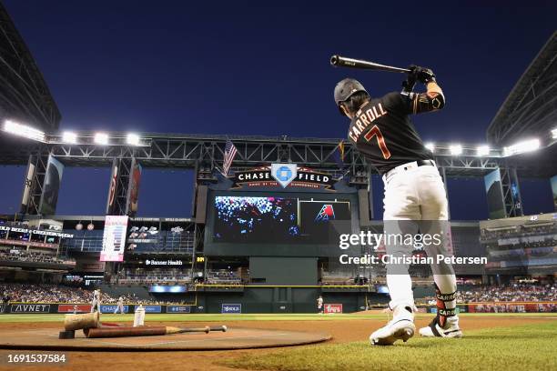 Corbin Carroll of the Arizona Diamondbacks warms up on deck during the first inning of the MLB game against the San Francisco Giants at Chase Field...