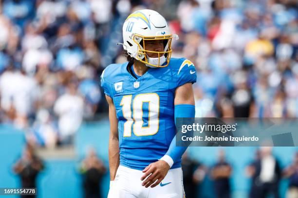 Justin Herbert of the Los Angeles Chargers looks on during the game against the Tennessee Titans at Nissan Stadium on September 17, 2023 in...