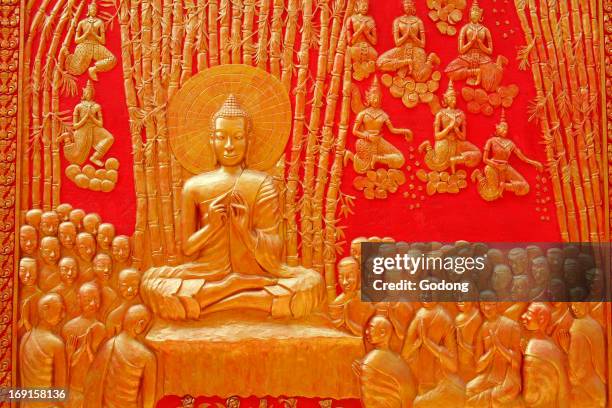 Sculpture in Wat Ounalom, Buddha teaching to his disciples in Veluvana bamboo forest