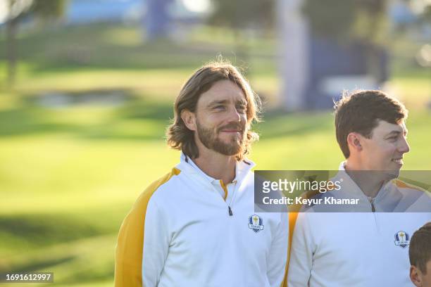 Team Europe players Tommy Fleetwood and Matthew Fitzpatrick smile during a team photo call prior to the 2023 Ryder Cup at Marco Simone Golf Club on...