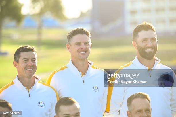 Team Europe players Rory McIlroy, Justin Rose and Jon Rahm smile during a team photo call prior to the 2023 Ryder Cup at Marco Simone Golf Club on...