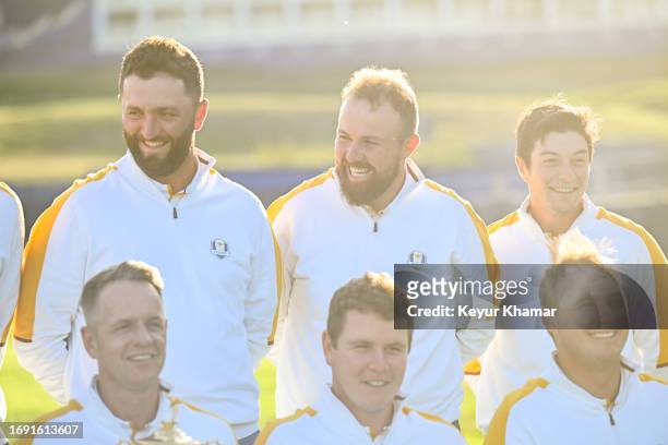 Team Europe players Jon Rahm, Shane Lowry, Viktor Hovland, Sepp Straka, Robert MacIntyre and Captain Luke Donald smile during a team photo call prior...