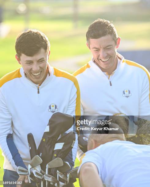 Team Europe players Rory McIlroy and Matthew Fitzpatrick smile during a team photo call prior to the 2023 Ryder Cup at Marco Simone Golf Club on...