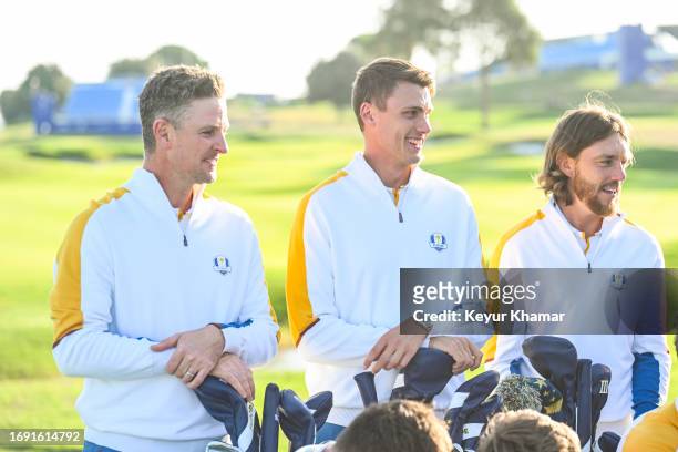 Justin Rose, Ludvig Aberg and Tommy Fleetwood smile during a team photo call prior to the 2023 Ryder Cup at Marco Simone Golf Club on September 26,...