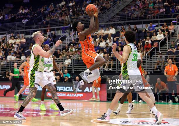 Patrick Miller of the Taipans drives to the basket during the 2023 NBL Blitz match between Cairns Taipans and South East Melbourne Phoenix at Gold...