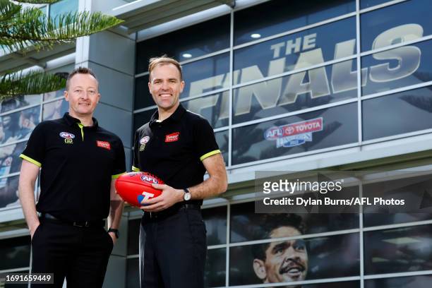 Goal Umpires Adam Wojcik and Angus McKenzie-Wills pose for a photo during the 2023 Grand FInal Umpires Announement at AFL House on September 27, 2023...