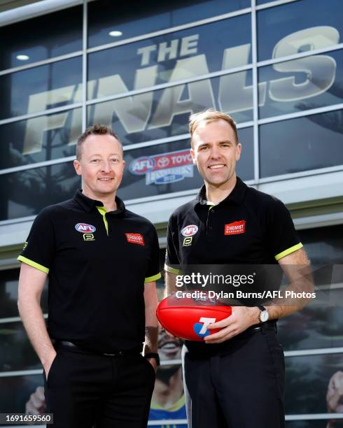 Goal Umpires Adam Wojcik and Angus McKenzie-Wills pose for a photo during the 2023 Grand FInal Umpires Announement at AFL House on September 27, 2023...