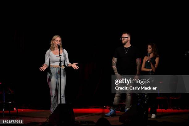 Ava Suppelsa, Keith Griner, and Eryn Cooper speak about the cause at the Spreading Hope on the Row event at 3rd & Lindsley on September 26, 2023 in...