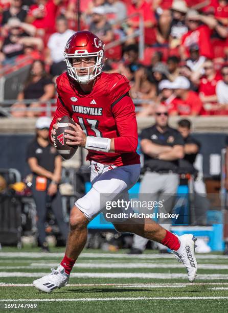 Jack Plummer of the Louisville Cardinals rolls out to pass during the game against the Boston College Eagles at Cardinal Stadium on September 23,...