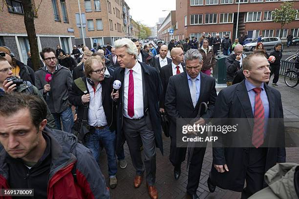 The leader of the Dutch far-right Party for Freedom Geert Wilders speaks to the press during his visit to the Schilderswijk district in The Hague,...