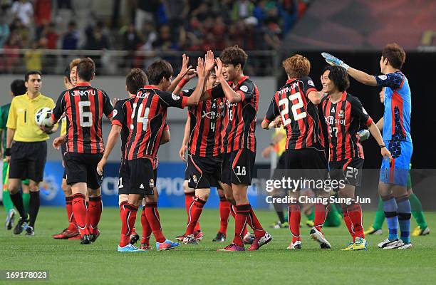 Seoul players celebrate after the AFC Champions League round of 16 match between FC Seoul and Beijing Go'an at Seoul World Cup Stadium on May 21,...