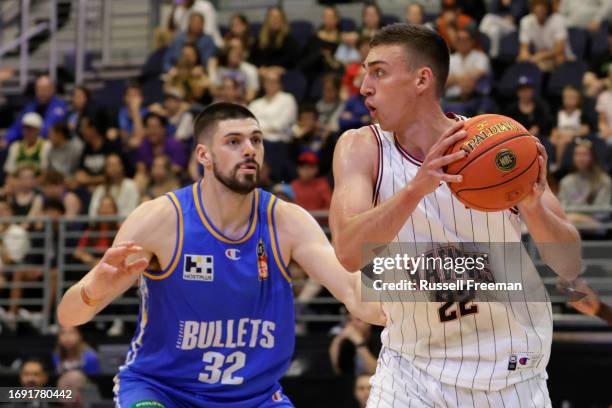 Mason Peatling of the Hawks looks to pass during the 2023 NBL Blitz match between Brisbane Bullets and Illawarra Hawks at Gold Coast Convention and...