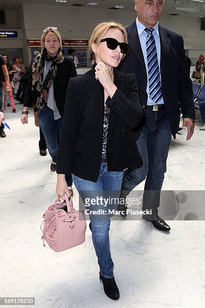 Kylie Minogue is seen at Nice airport during the 66th Annual Cannes Film Festival on May 21, 2013 in Nice, France.