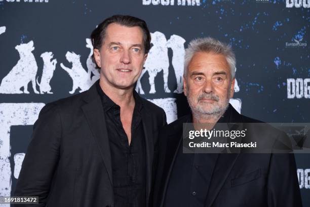Dominique Boutonnat and director Luc Besson attend the "Dogman" premiere at Cinema UGC Normandie on September 19, 2023 in Paris, France.