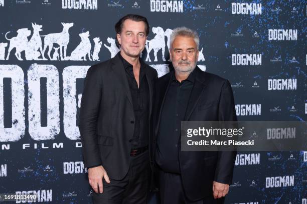 Dominique Boutonnat and director Luc Besson attend the "Dogman" premiere at Cinema UGC Normandie on September 19, 2023 in Paris, France.