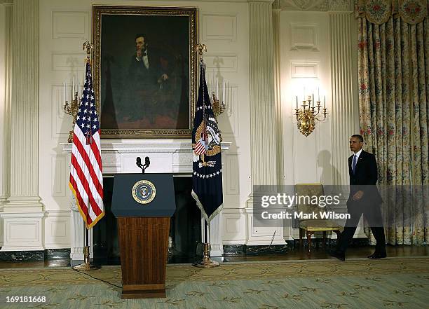 President Barack Obama walks to the podium to speak about the tornadoes that impacted Oklahoma yesterday in the State Dining Room at the White House...