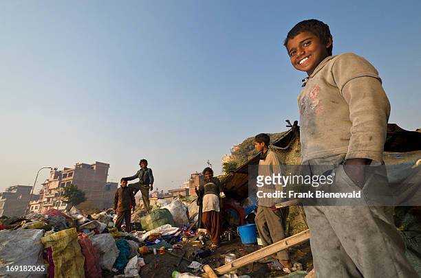 Children live, play and work on the garbage dump at Bhagmati River in the middle of the city. The garbage collected off the streets of the capital...