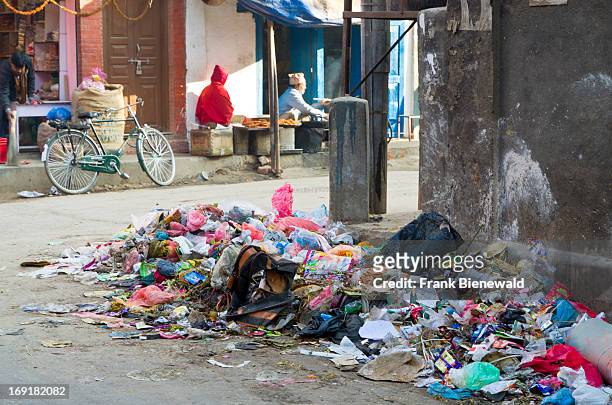 Garbage piling up on the street. The garbage collected off the streets of the capital city is mostly sorted for recycling by low-caste workers...