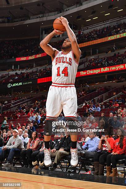 Daequan Cook of the Chicago Bulls shoots the ball against the Miami Heat in Game Four of the Eastern Conference Semifinals during the 2013 NBA...