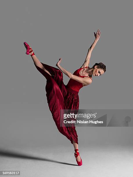 ballerina performing developpe efface - human body part stock pictures, royalty-free photos & images