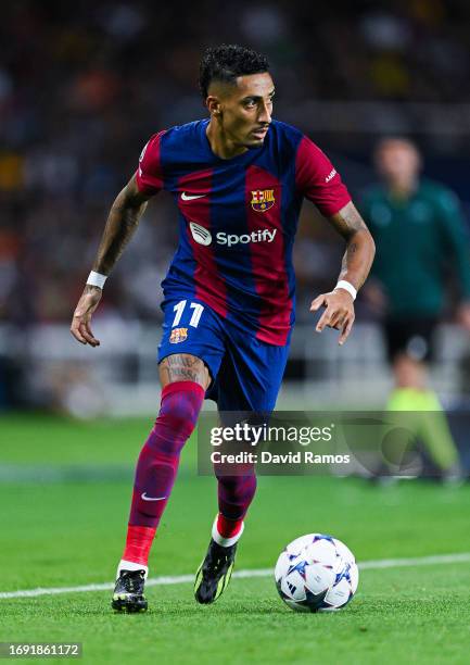 Rafinha of FC Barcelona runs with the ball during the UEFA Champions League match between FC Barcelona and Royal Antwerp FC at Estadi Olimpic Lluis...