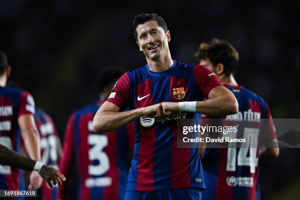 Robert Lewandowski of FC Barcelona celebrates after scoring their team's second goal during the UEFA Champions League match between FC Barcelona and...