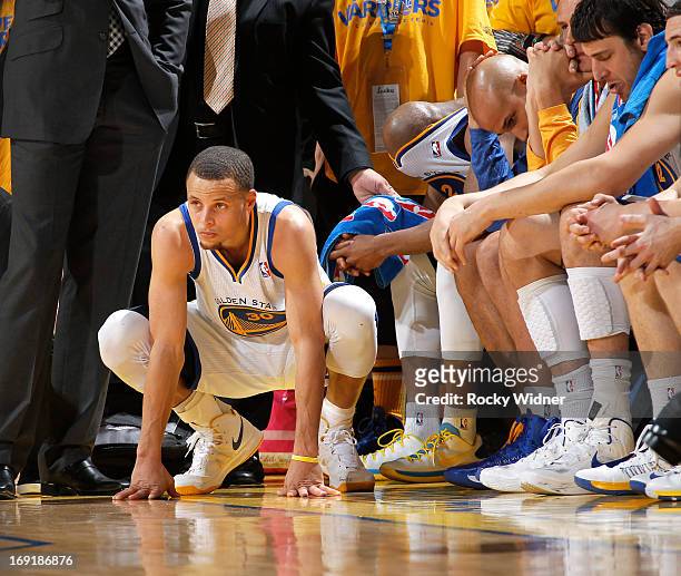 Stephen Curry of the Golden State Warriors looks on against the San Antonio Spurs in Game Six of the Western Conference Semifinals during the 2013...