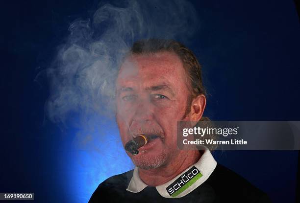 Portrait of Miguel Angel Jimenez of Spain ahead of the BMW PGA Championship at Wentworth on May 21, 2013 in Virginia Water, England.