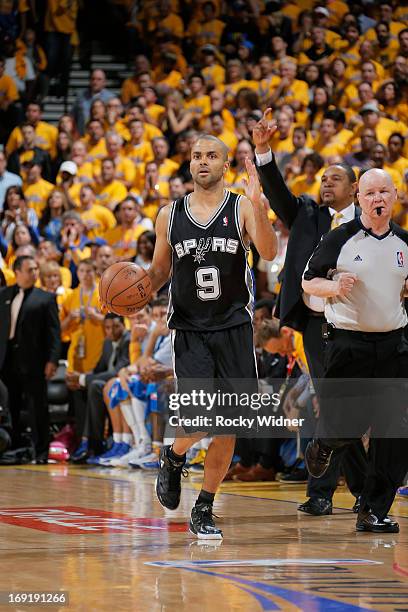 Tony Parker of the San Antonio Spurs brings the ball up the court against the Golden State Warriors in Game Six of the Western Conference Semifinals...