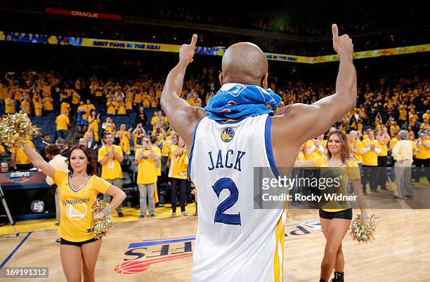 An emotional Jarrett Jack of the Golden State Warriors walks around to thank fans for their continued support after losing to the San Antonio Spurs...