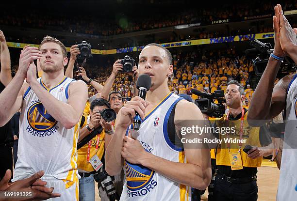 Stephen Curry of the Golden State Warriors thanks fans for their continued support throughout the season after falling to the San Antonio Spurs in...