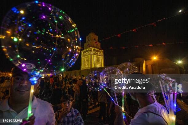People from within the country and abroad attend Mawlid al-Nabi celebrations near Ukbe bin Nafi Mosque in Kairouan, Tunisia on September 26, 2023.