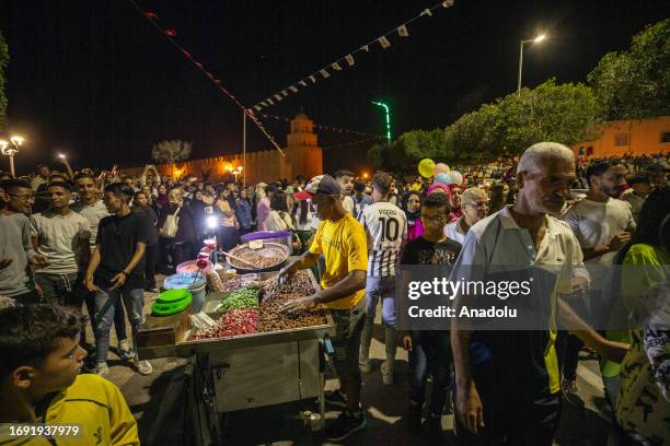 People from within the country and abroad attend Mawlid al-Nabi celebrations near Ukbe bin Nafi Mosque in Kairouan, Tunisia on September 26, 2023.