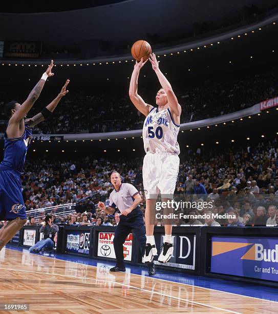 Mike Miller of the Orlando Magic takes the jump shot during the game against the Washington Wizards at TD Waterhouse Centre on December 6, 2002 in...
