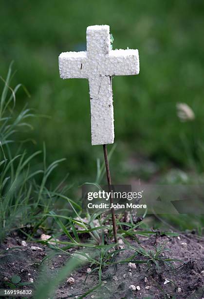 The remains of an unidentified immigrant await exhumation from a cemetery on May 21, 2013 in Falfurrias, Texas. Teams from Baylor University and the...