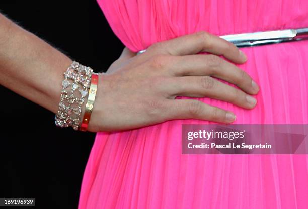 Jewelry detail is seen as Jessica Hart attends the 'Behind The Candelabra' premiere during The 66th Annual Cannes Film Festival at Theatre Lumiere on...