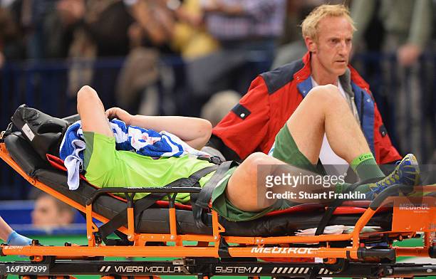 Ivan Nincevic of Berlin is stretchered of the court with a serious injury during the DKB Bundeliga match between HSV Hamburg and Fuechse Berlin at O2...