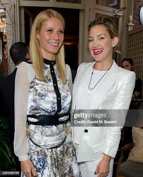 Gwyneth Paltrow and Kate Hudson pose at Goop's party to launch the summer season, at Mark's Club on May 21, 2013 in London, England.
