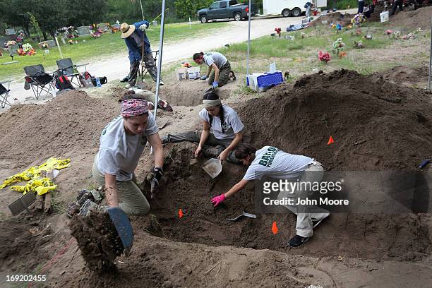 Forensic anthropology team from Baylor University unearths the remains of unidentified immigrants from a cemetery on May 21, 2013 in Falfurrias,...