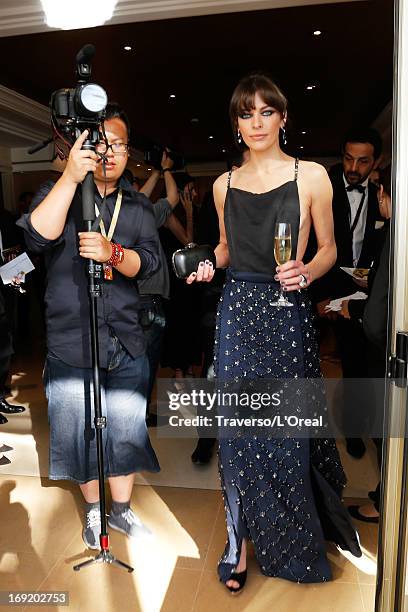 Actress Milla Jovovich attends the L'Oreal Cocktail Reception during The 66th Cannes Film Festival on May 21, 2013 in Cannes, France.