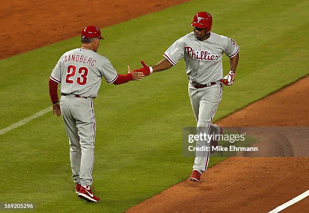 Delmon Young of the Philadelphia Phillies hits a solo home run during a game against the Miami Marlins at Marlins Park on May 21, 2013 in Miami,...