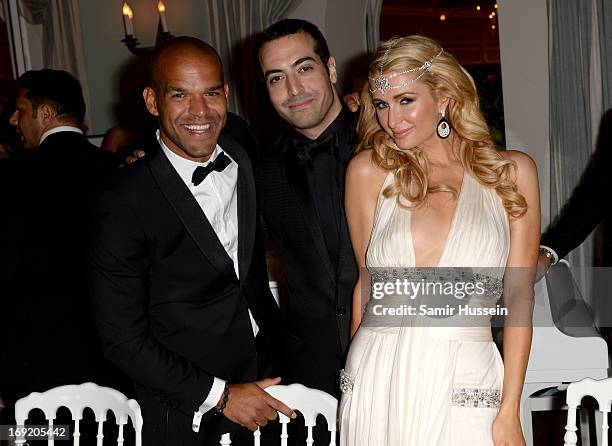 Actor Amaury Nolasco, Mohammed al Turki and Paris Hilton attends the 'De Grisogono' Party during The 66th Annual Cannes Film Festival at Hotel Du Cap...