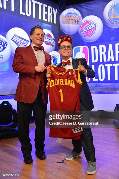 Owner Dan Gilbert and Nick Gilbert of the Cleveland Cavaliers poses for a photo after winning the overall number one pick during the 2013 NBA Draft...