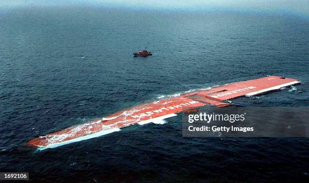 The Norwegian-registered cargo Tricolor lies on its side December 15, 2002 at the mouth of the Dover Strait seperating England and France. The MV...