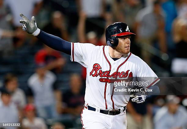 Freddie Freeman of the Atlanta Braves hits a game-winning RBI single in the bottom of the 10th inning to give the Braves a 5-4 win over the Minnesota...