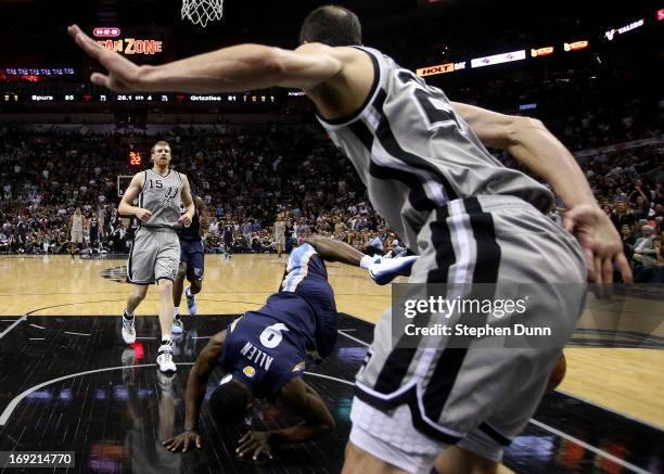 Tony Allen of the Memphis Grizzlies falls to the court after he drew a flagrant foul from Manu Ginobili of the San Antonio Spurs in the fourth...